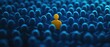 © SHOTPRIME STUDIO - individuality, uniqueness, isolation, concept of standing out in a crowd with a single yellow figure among a sea of dark silhouettes