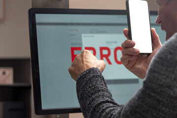 Poster - Shocked concerned man finding financial payment error and calling to customer support. Close-up of a man with a concerned expression, facing a monitor showing an error alert