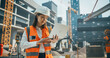 © Gorodenkoff - Portrait of a Beautiful Japanese Female Civil Engineer Working on a Laptop at a Construction Site. Young Asian Woman Standing Outdoors, Using Computer for Planning and Developing a Real Estate Project