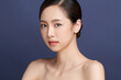 © kitthanes  - Beautiful young asian woman with clean fresh skin on blue background, Face care, Facial treatment, Cosmetology, beauty and spa, Asian women portrait.