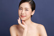© kitthanes  - Beautiful young asian woman with clean fresh skin on blue background, Face care, Facial treatment, Cosmetology, beauty and spa, Asian women portrait.