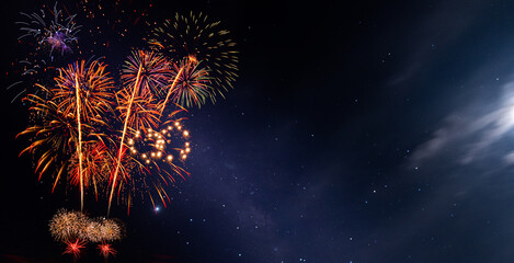 Wall Mural - fireworks with blur milky way background