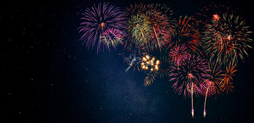 Wall Mural - fireworks with blur milky way background