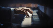 © Gorodenkoff - Close Up on Pianist Hands Playing a Mesmerizing Jazz Melody on a Black Grand Piano. Anonymous Artist is Focused on Creating Beautiful Instrumental Sonata as He Plays on Stage for the Audience