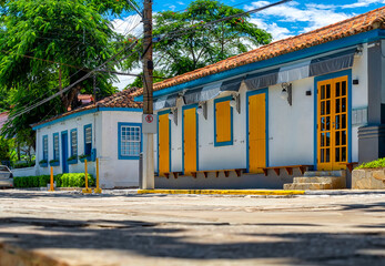 Wall Mural - Seafront with cozy houses in Buzios, Rio de Janeiro. Brazil. Cityscape of Armacao dos Buzios.