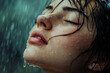 © Volodymyr - A beautiful close-up portrait of a young woman, drenched by the rain, her eyes closed as she looks up. Her expression is filled with intense emotion