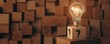 © InfinityArtCreator - Light Bulb on Wooden Block with Question Marks Symbolizing Ideas