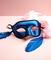 Aufkleber - Soft focus photo shows a blue silk sleeping mask and feathers against a pale pink background with empty space around them.