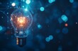 © Daria - Illuminating innovation  a glowing light bulb symbolizing digital technology and connectivity