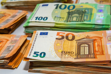 Euro banknote cash money. Lot of banknotes of European union currency close up. Financial investment, savings, income earnings concept.