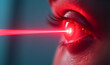 © Radorog. - Red laser beam in the eye