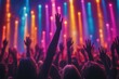 © Lux Images - Crowd Raising Hands at a Concert with Vibrant Stage Lighting