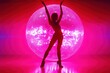© Oksana - Silhouette of a dancer in front of a pink disco ball.