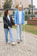 © ADDICTIVE STOCK - Blind blind couple enjoying a walk outdoors with white canes