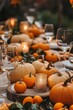© Maxim Borbut - This elegant, rustic, homey fall table setting includes pumpkins, candles, and dried flowers for a wedding or Thanksgiving celebration.