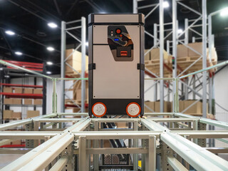 Poster - warehouse robot. automated cart rides along mezzanine. automation of fulfillment center. warehouse a
