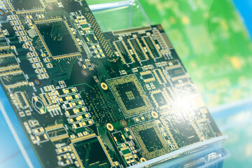 Poster - Digital computer board close up. Fragment of motherboard for system unit. Electronic components from micro-industrial industry. PCB with space for microprocessors. Digital board on blue