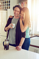 Canvas Print - Smile, hug and couple with coffee in kitchen for connection, morning romance and love in home. Mature man, woman and embrace with drink beverage for support, loyalty and bonding with happy partner