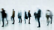© Atmospheric stock - Blurred motion of diverse adults walking in urban environment