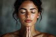 © john - A serene woman with closed eyes in a meditative prayer pose, embracing calm and mindfulness.