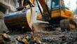 © c_ART_oons - close-up of an excavator demolishing concrete at a construction site