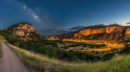 Wall Mural - Breathtaking Night View of Mountain Valley Under Starry Sky