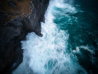 Poster - Giant ocean waves collide powerfully with sharp cliffs, sending sea foam swirling across the rocky shore, creating an exhilarating atmosphere