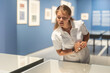 © JackF - Girl looks at various paintings and drawings at an art exhibition in a museum