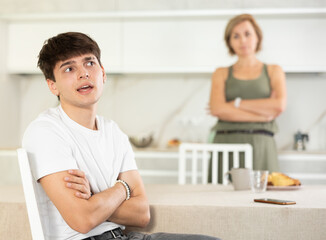 Wall Mural - Woman screams and swears at her adult son in connection with inappropriate behavior, violation of personal boundaries and space