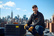 © Centric  - Hvac technician installing or repairing an air conditioning unit on a rooftop with the new york city skyline in the background