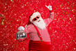 © deagreez - Photo of pensioner old man grey beard hold retro disco ball dance raise finger wear santa x-mas costume suspenders sunglass gloves striped shirt cap isolated red color background