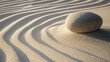 © ARM - Calm zen garden with carefully raked sand and a solitary stone creates a peaceful atmosphere