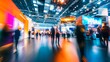 © Palung - Dynamic business expo with a lively trade show floor featuring bustling crowds and vibrant booths.