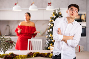 Wall Mural - Quarrel of wife and husband during christmas celebration in home