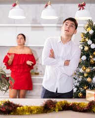 Wall Mural - Quarrel of wife and husband during christmas celebration in home