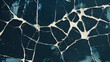 © ARM - Cracked paint texture revealing the underlying surface on a dark blue background