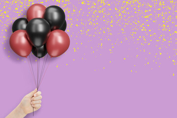 Aufkleber - Female hand holds bunch of red and black balloons on violet background with confetti. Empty space for text