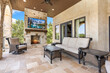 © Allison - Elegant outdoor living space featuring comfortable seating and stunning views