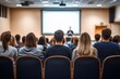 © zong - Speaker Addressing Audience in Modern Lecture Hall at Business Conference Event