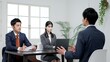 © mapo - 就職活動で面接をするビジネスパーソン