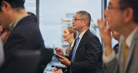 Aufkleber - Audience, conference and seminar with business people in office for development or learning. Corporate, education and event with Japanese employee group in professional workplace together as crowd