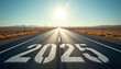 © dapra01 - an open road stretching into the horizon, with the number '2025' painted boldly on the asphalt in large, clear digits