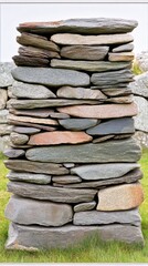 Poster - Large brown and gray stones form a textured wall that conveys a sense of natural beauty and elegance, providing design inspiration.