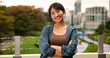 © peopleimages.com - Arms crossed, exercise and portrait of woman in city for cardio or marathon training routine. Bridge, fitness and smile of happy Japanese sports athlete or runner outdoor for health or wellness