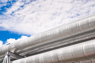 pipeline line close-up against blue sky and clouds