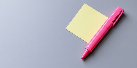 Poster - Bright pink marker placed alongside a sticky note on a light grey background, showcasing a flat lay arrangement that highlights the vibrant colors of both the marker and sticky note.