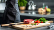 © A-TiMe  - Chef preparing premium raw steak with fresh vegetables in modern kitchen culinary art contemporary environment close-up viewpoint
