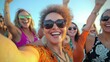 © Tadeusz - Joyful group of women celebrating together at sunset, showcasing diversity and friendship.