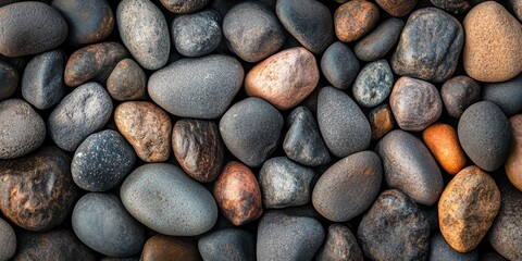Aufkleber - Textured background composed of small pebbles, creating a natural and calming aesthetic. This background of small pebbles can enhance visual appeal in various designs and projects.