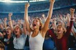 © Viktor - Excited crowd in stadium raises arms. People cheer during a sporting event. Thrilling atmosphere in arena. Fans enjoy game. Energetic crowd celebrates victory. Lots of happy people.